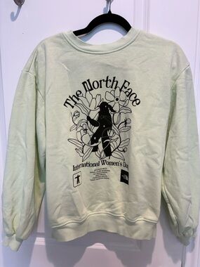 The North Face Light Green Graphic Crewneck- International Women’s Day